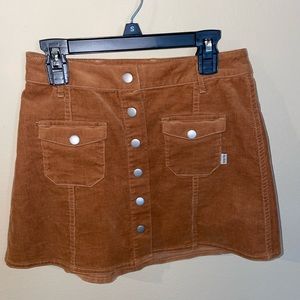 Suede button skirt